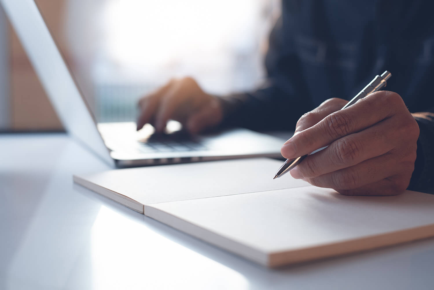 Man Working notepad and computer